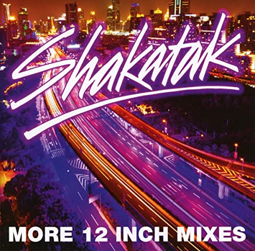 Shakatak album cover: purple text over a nighttime highway scene.