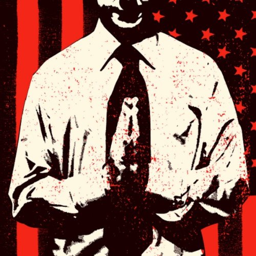 Man in suit and tie against a red and black star background.