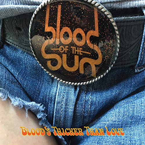 CD cover with orange lettering on a denim background.