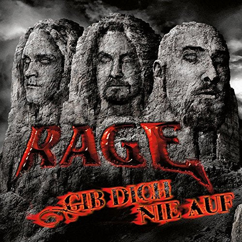 Album cover for Rage’s “Gib Dich Nie Auf” featuring sculpted faces.