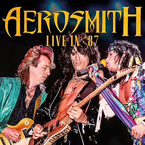 Aerosmith album cover, "Live In '87," featuring three band members performing.