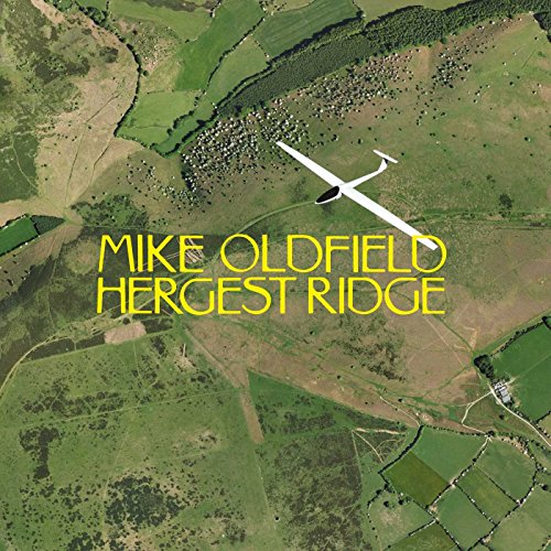 Aerial view of a glider flying over green fields with album title text overlaid.