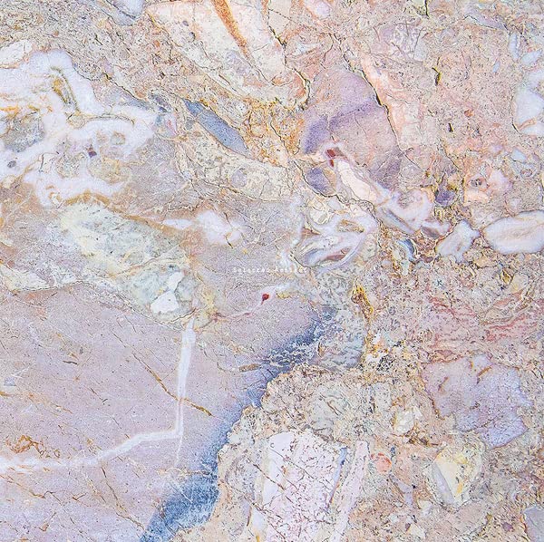 Abstract marbled vinyl record cover in shades of pink, beige, and white.