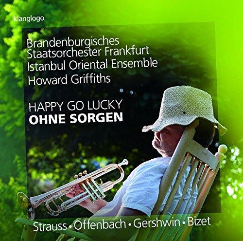 CD cover: man in hat relaxing with a trumpet, green background.