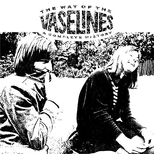 Black and white album cover featuring two people sitting outdoors with band title text.