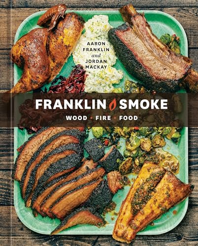 Cookbook cover showing a platter of smoked meats, vegetables, and potato salad.