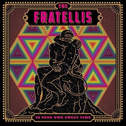 Vinyl album cover: couple embracing against a colorful geometric background.