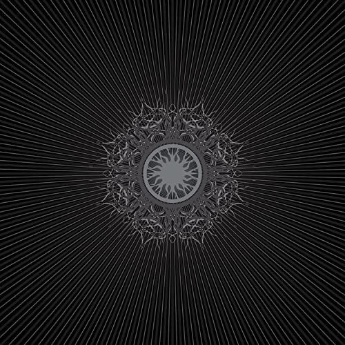 Black CD cover with ornate, silver-grey circular design and radiating lines.