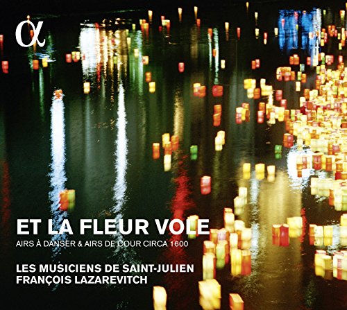 CD cover with blurred lights on water, text reading "Et La Fleur Vole".