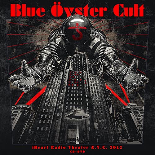 Blue Oyster Cult album cover featuring a giant robot and a UFO.
