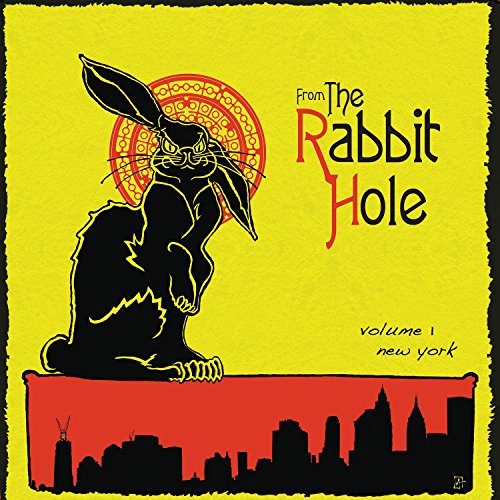 Yellow album cover with a black rabbit over a city skyline.