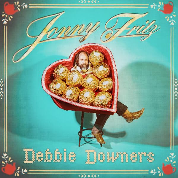 Album cover: man in heart-shaped box of chocolates, turquoise background.
