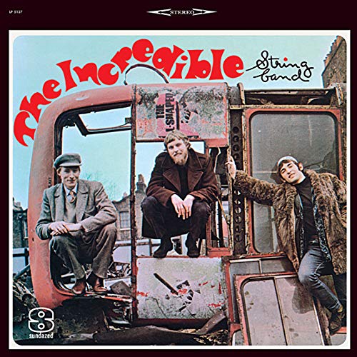 Album cover featuring three men posing in front of a red vehicle.