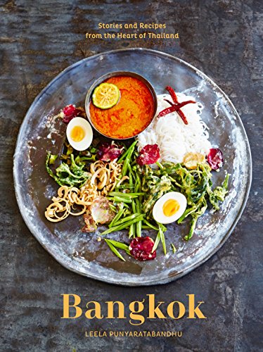 Cookbook cover featuring a vibrant overhead shot of Thai food.