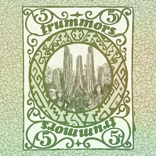Vinyl record cover with desert landscape inside an ornate green frame.