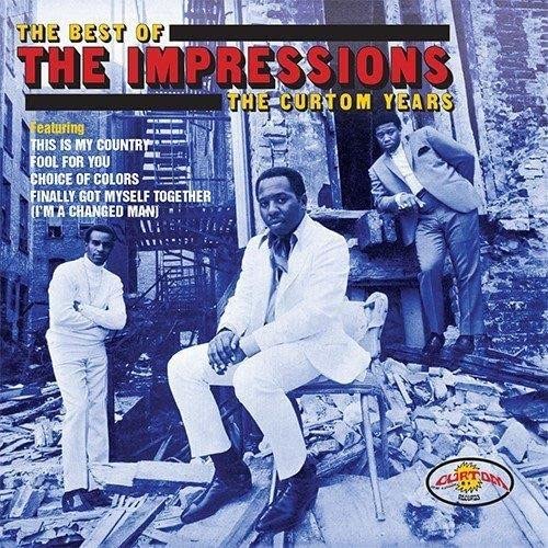 CD cover for The Impressions’ “Best of” album, featuring four men in suits.