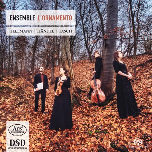 Four musicians with instruments pose in a forest of autumn leaves.