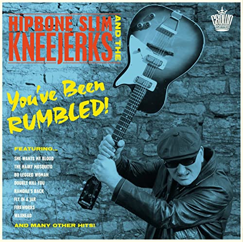 Vinyl record cover: Hipbone Slim and the Kneejerks, guitar, and man.