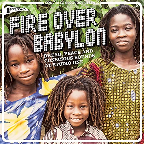 Record cover featuring three children with dreadlocks and patterned clothing.
