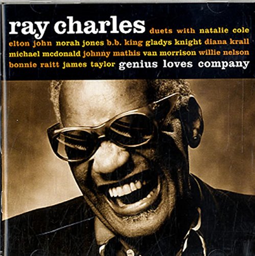 Sepia-toned portrait of Ray Charles wearing sunglasses and laughing on a CD cover.