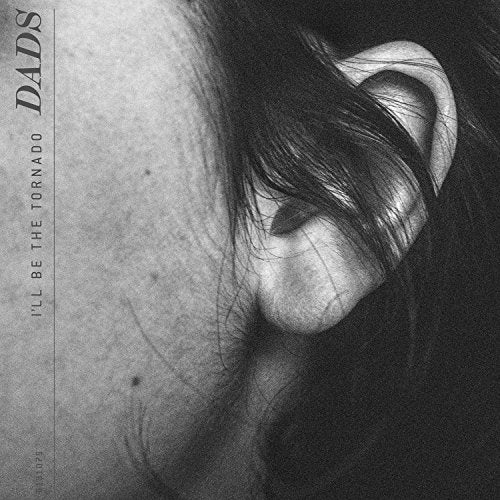 Black and white album cover featuring a close-up of a face, partially obscured.