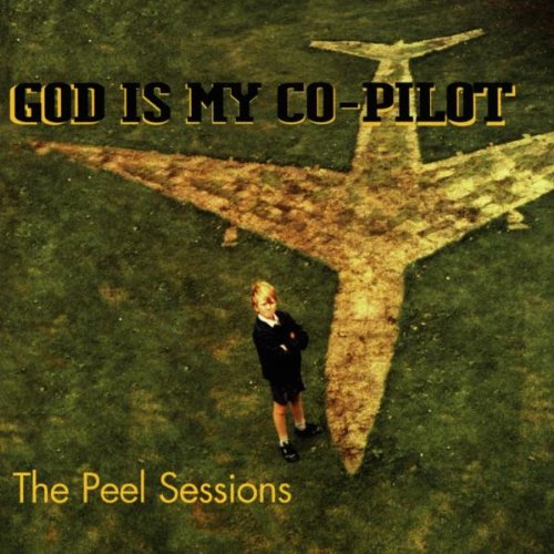 Album cover: boy standing by a large, grass airplane outline.