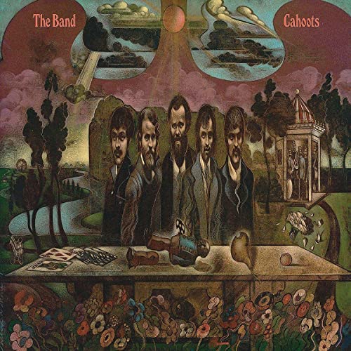 Album cover for The Band’s “Cahoots” featuring the band and surreal landscape.