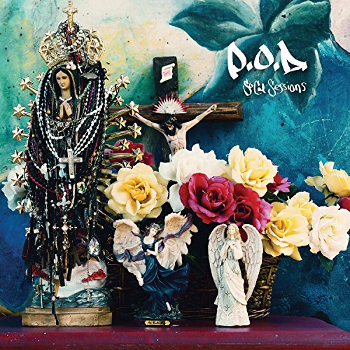 CD cover with religious statues, roses, and a blue, textured background.