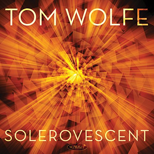 CD cover for Tom Wolfe’s “Solervescent” with abstract orange geometric design.