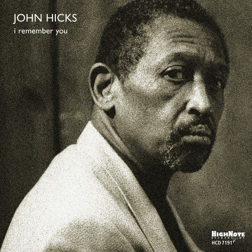 Black and white portrait of jazz musician John Hicks on CD cover.