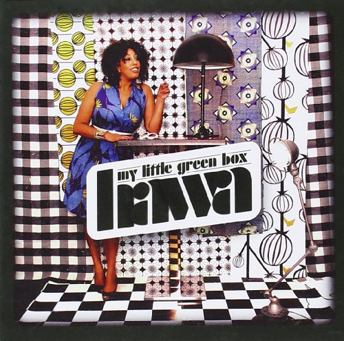 CD cover featuring a woman in blue dress against patterned backdrop.