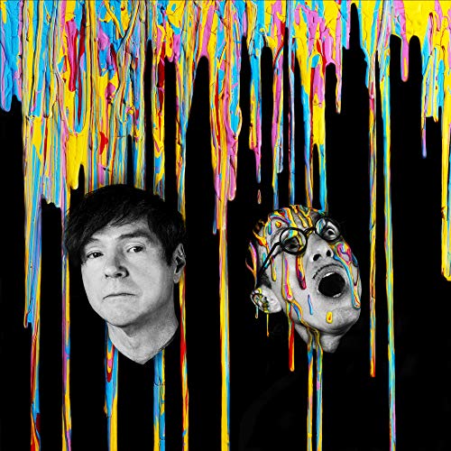 Black and white portraits of two men with colorful dripping paint.