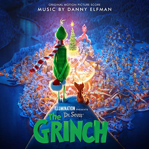 The Grinch and Max overlook a brightly lit Whoville town.