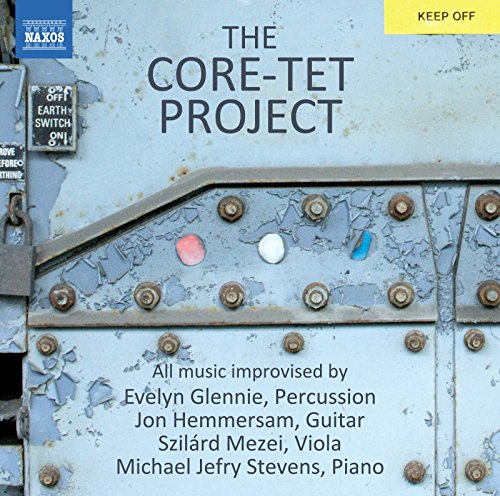CD cover for "The Core-Tet Project" featuring a metal wall background.