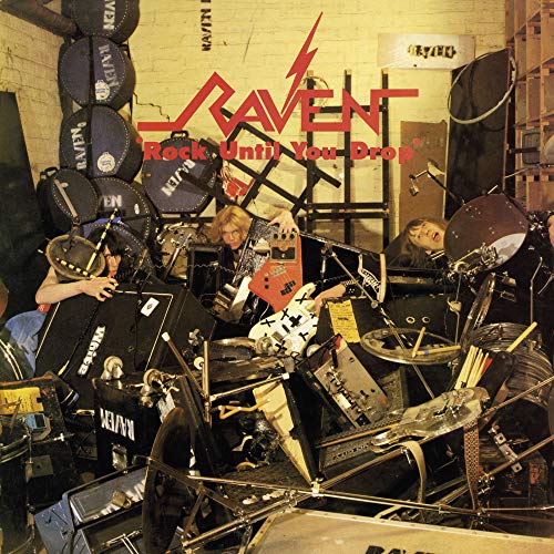 Album cover for Ravenās āRock Until You Dropā featuring band amidst equipment.
