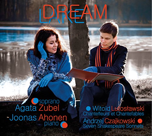 CD cover: woman and man with sheet music, outdoor setting.