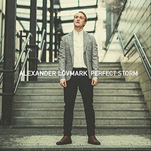 Album cover for Alexander Lövmark’s “Perfect Storm,” featuring a man on stairs.