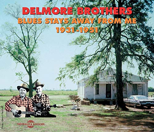 CD cover: Delmore Brothers, two musicians with a guitar, rural scene.