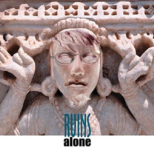 CD cover: face superimposed on ornate stone carving with text "RUINS alone".