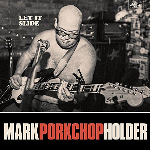 Black and white vinyl record cover featuring a blues musician playing guitar.