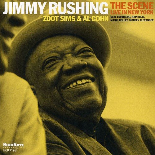 CD cover of Jimmy Rushing, smiling and wearing a hat, in yellow tones.