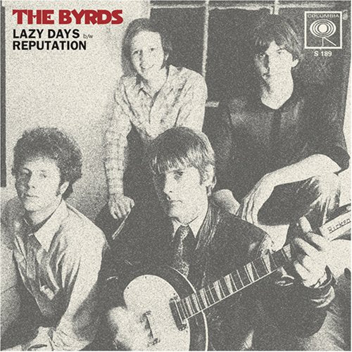 Black and white photo of The Byrds, a four-member rock band.