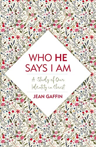 Book cover with floral pattern and red text: "Who He Says I Am.
