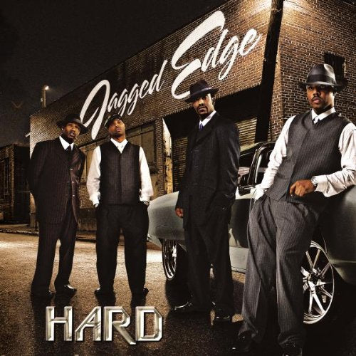 Jagged Edge album cover, four men in suits standing near a car.