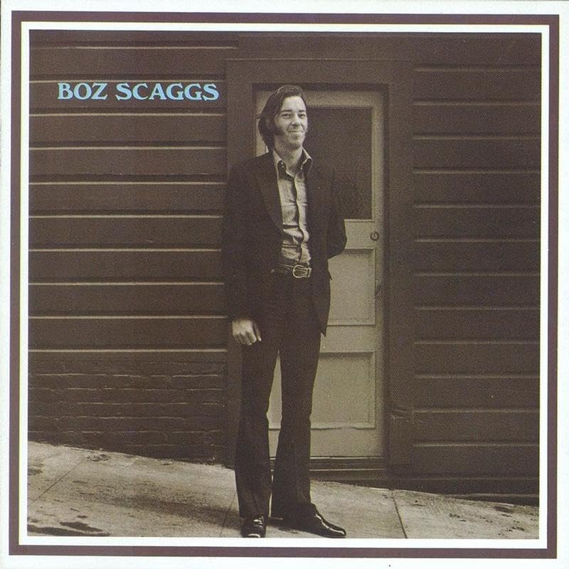 Black and white album cover featuring Boz Scaggs standing by a door.