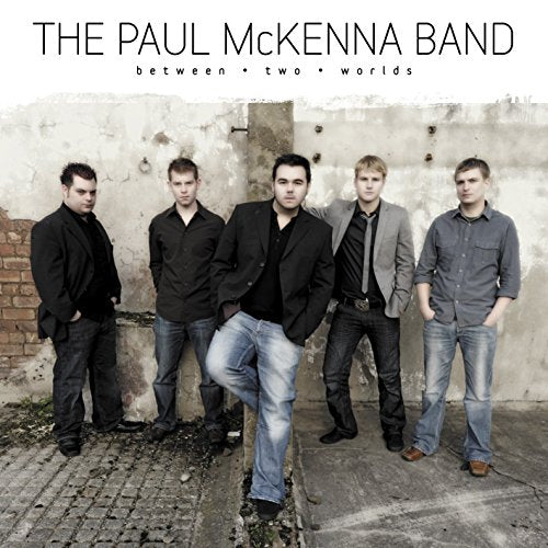 CD cover for The Paul McKenna Band’s “Between Two Worlds” featuring five men.