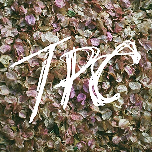 Tokyo Police Club “TPC” CD cover with white lettering on a floral background.