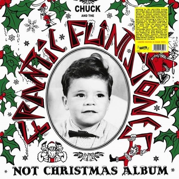 Vinyl record cover featuring a portrait of Chuck Berry with festive decorations.