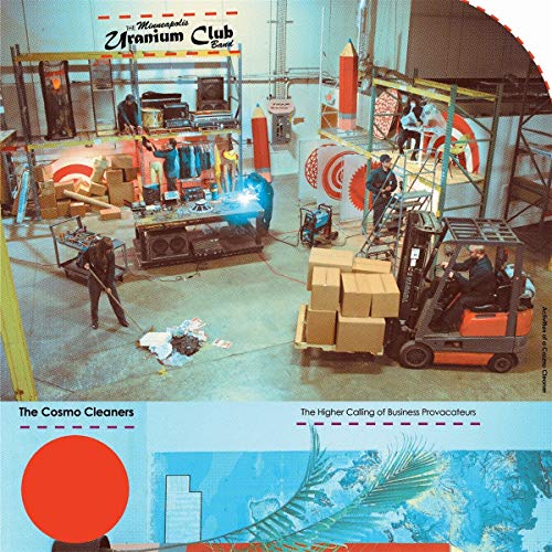 Vinyl album cover: industrial interior with workers, red circle, and text.