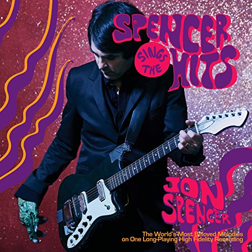 Jon Spencer poses with a guitar on the album cover "Spencer Sings The Hits!".